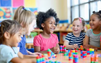 A lifestyle stock photography of a group of young children engaged in an interactive learning activity with a teacher in a bright, airy classroom, everyone is smiling and actively participating, the scene is vibrant and filled with natural light streaming through large windows, the composition includes colorful educational materials and children's artwork on the walls, the lighting is soft and natural, framing focuses on the joyful expressions and collaborative atmosphere, the mood is positive and inspiring, camera angle is at eye level with the children to capture their engagement and excitement. --ar 3:2 --no text, fonts, letters, watermark, words, typography, slogans, signature, camera --v 6.0 --s 250
