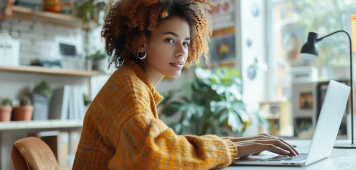 A lifestyle stock photography of a professional woman sitting at a modern desk, typing on a sleek laptop with a focused expression, in a bright, well-organized home office with motivational posters on the wall, natural light streaming through a large window, close-up framing highlighting her hands on the keyboard and her attentive face, emphasizing a productive and aspirational mood, captured with a high-resolution camera at a slight overhead angle. --ar 3:2 --no text, fonts, letters, watermark, words, typography, slogans, signature, camera --v 6.0 --s 250